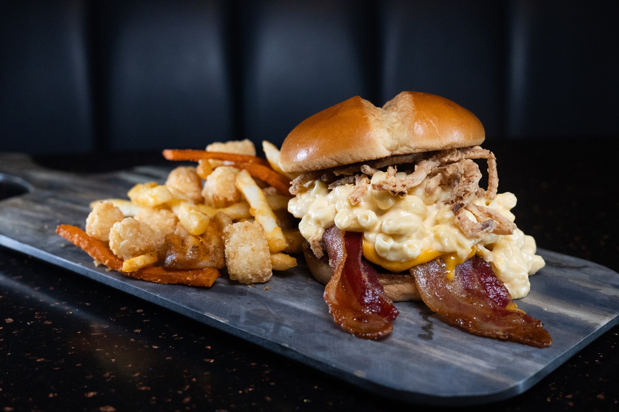 Mac Madness burger with assorted fries